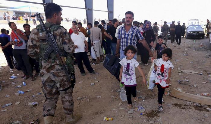 Civili in fuga da Mosul