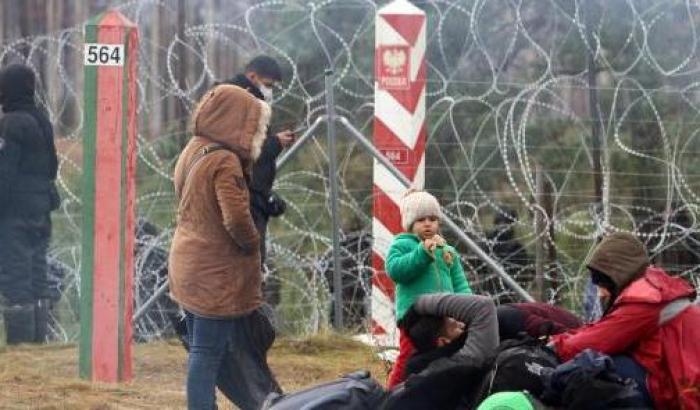 Migranti al confine tra Bielorussia e Polonia